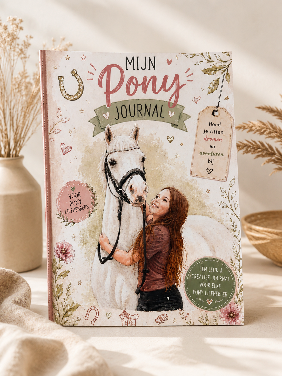 Voorkant van Mijn Pony Journal, een fysiek invulboek voor kinderen met lesverslagen, doelen en ponyherinneringen.